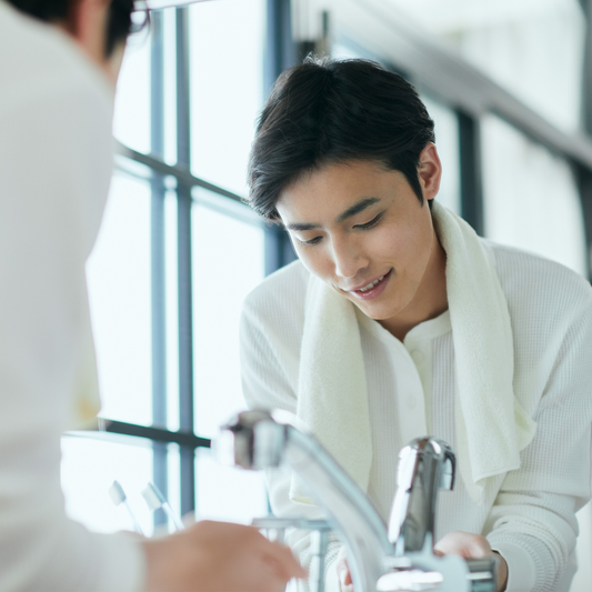 asian man at sink