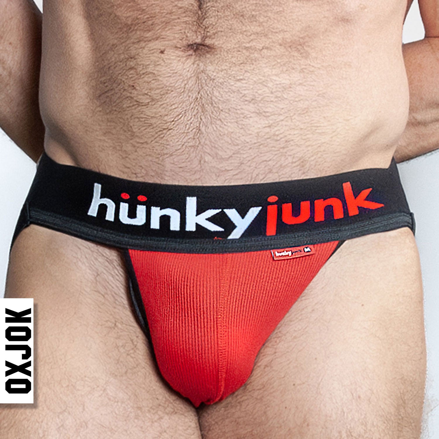 Hunker Comfy-Pouch Slider-Strap Jock Red Hot Small | 840215124890 | Available at EroticWarehouse.com